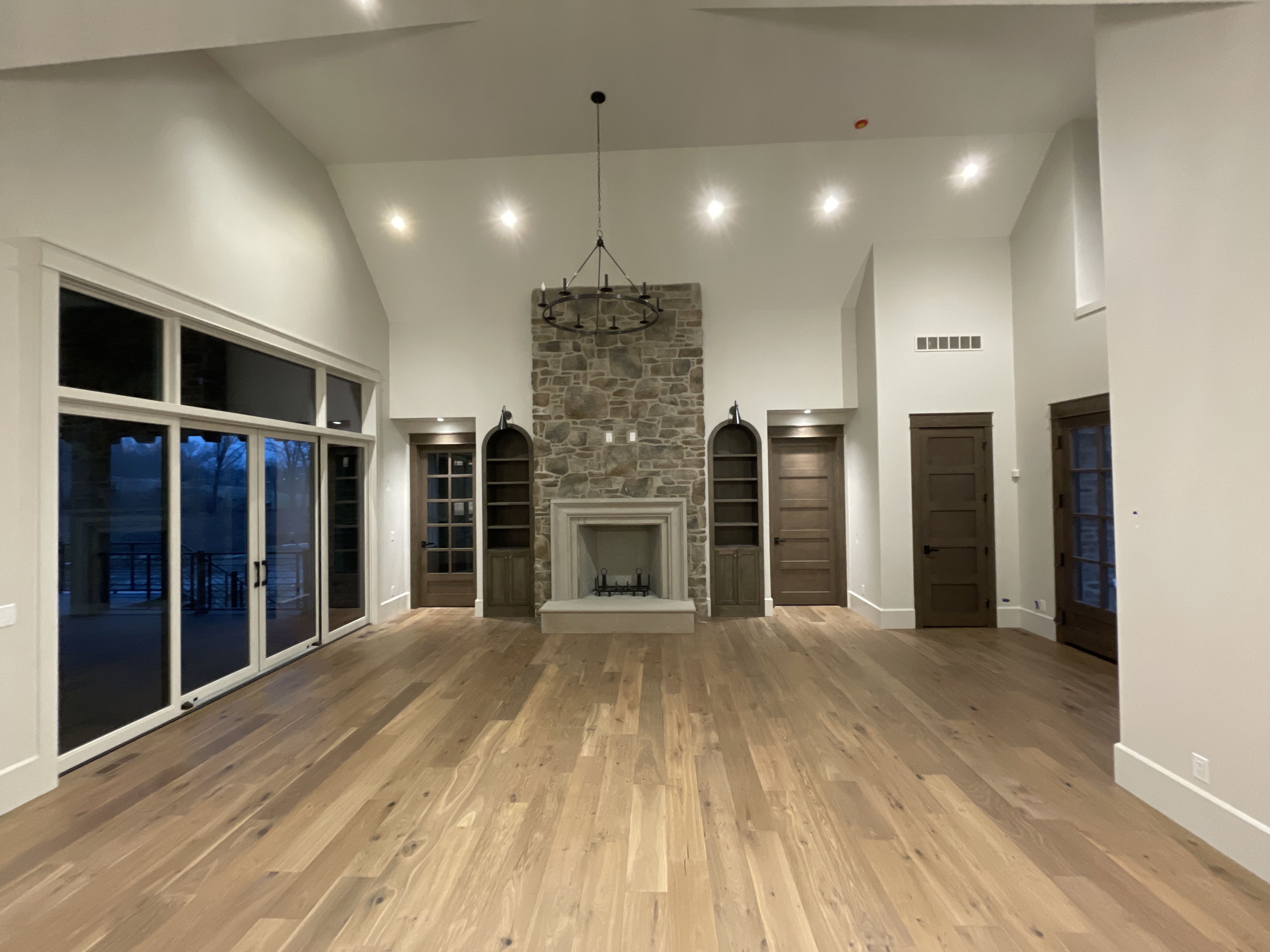 Fred Olivieri Custom Homes Great Room or Living Room inspiration Stone fireplace