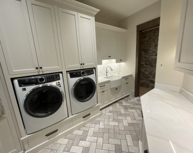 Fred Olivieri Custom Homes Laundry room inspiration Cottage Home laundry room built in custom millwork